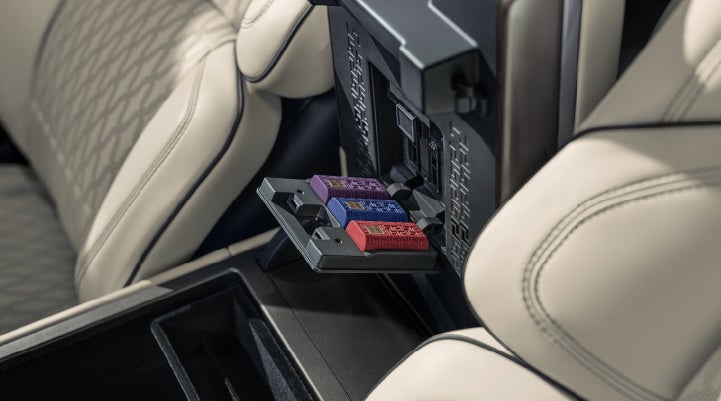 Digital Scent cartridges are shown in the diffuser located in the center arm rest. | Pugmire Lincoln of Marietta in Marietta GA
