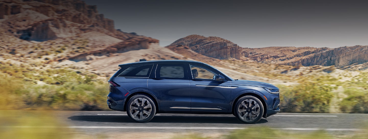 A 2024 Lincoln Nautilus® SUV is being driven in a desert setting. | Pugmire Lincoln of Marietta in Marietta GA