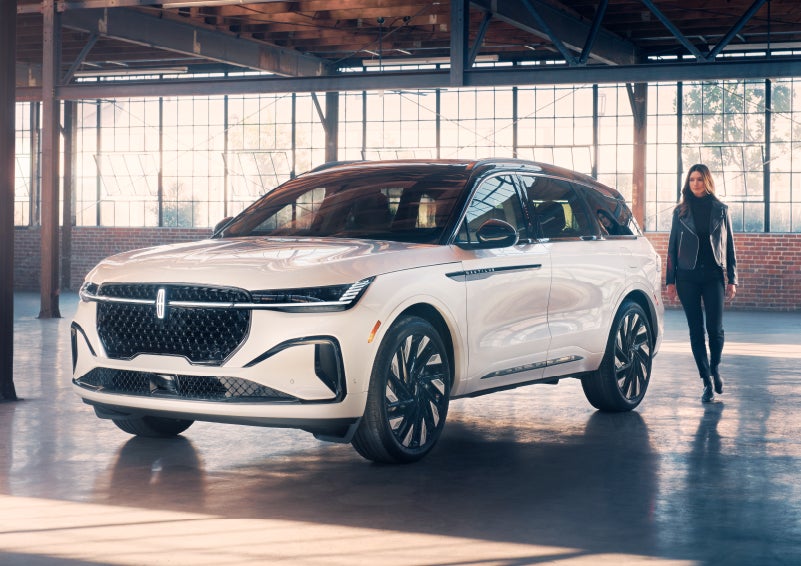 A person approaches a 2024 Lincoln Nautilus® SUV. | Pugmire Lincoln of Marietta in Marietta GA