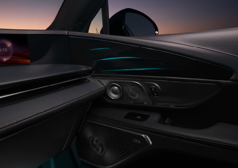 Selectable ambient lighting glows in the passenger door panel. | Pugmire Lincoln of Marietta in Marietta GA