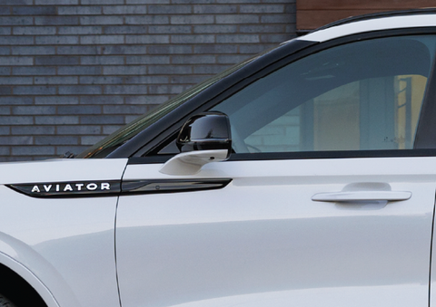 The driver’s door of a white 2025 Lincoln Aviator® SUV is showcased. | Pugmire Lincoln of Marietta in Marietta GA