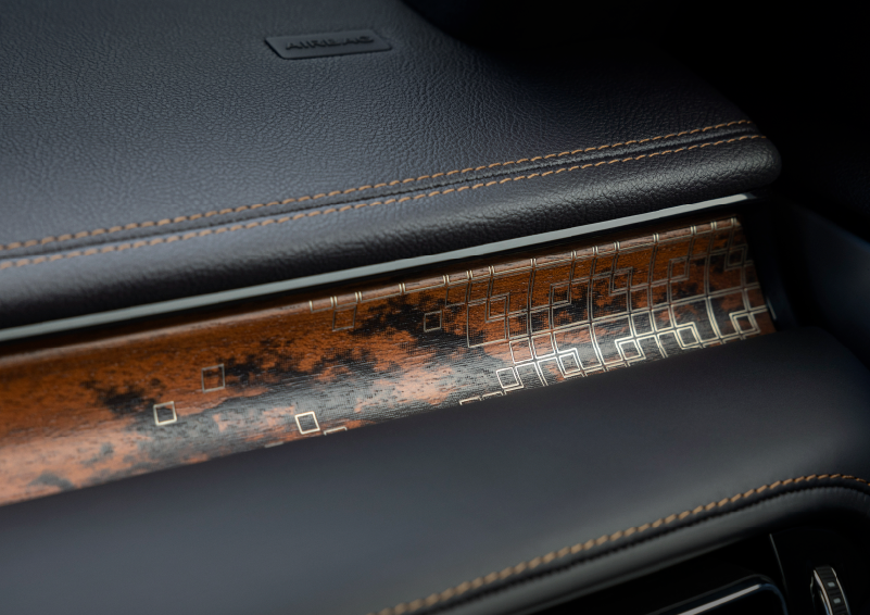 A close-up shot of the 2025 Lincoln Aviator® dashboard with unique black and brown accents, and brown stitching. | Pugmire Lincoln of Marietta in Marietta GA