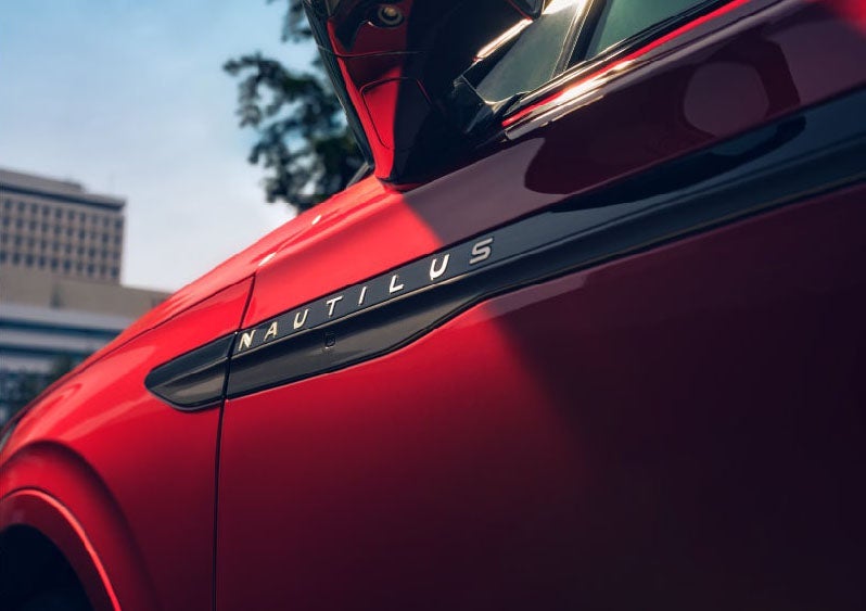A side badge on the passenger door reads Nautilus. | Pugmire Lincoln of Marietta in Marietta GA