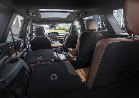 One side of the PowerFold® third-row seat and a second-row seat are folded forward in the 2026 Lincoln Aviator® SUV. | Pugmire Lincoln of Marietta in Marietta GA