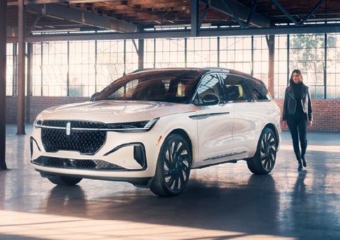 A person approaches a 2026 Lincoln Nautilus® SUV. | Pugmire Lincoln of Marietta in Marietta GA