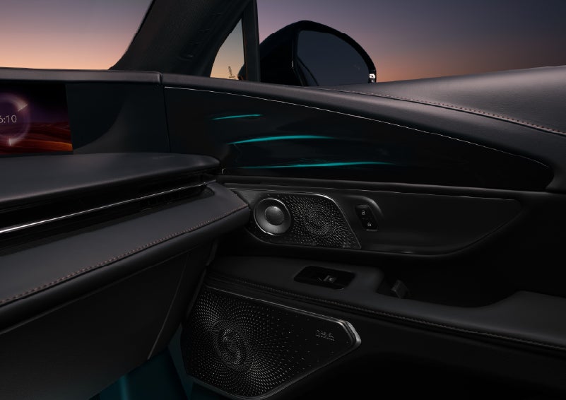 Selectable ambient lighting glows in the passenger door panel. | Pugmire Lincoln of Marietta in Marietta GA