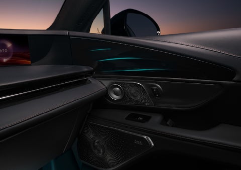 Selectable ambient lighting glows in the passenger door panel. | Pugmire Lincoln of Marietta in Marietta GA